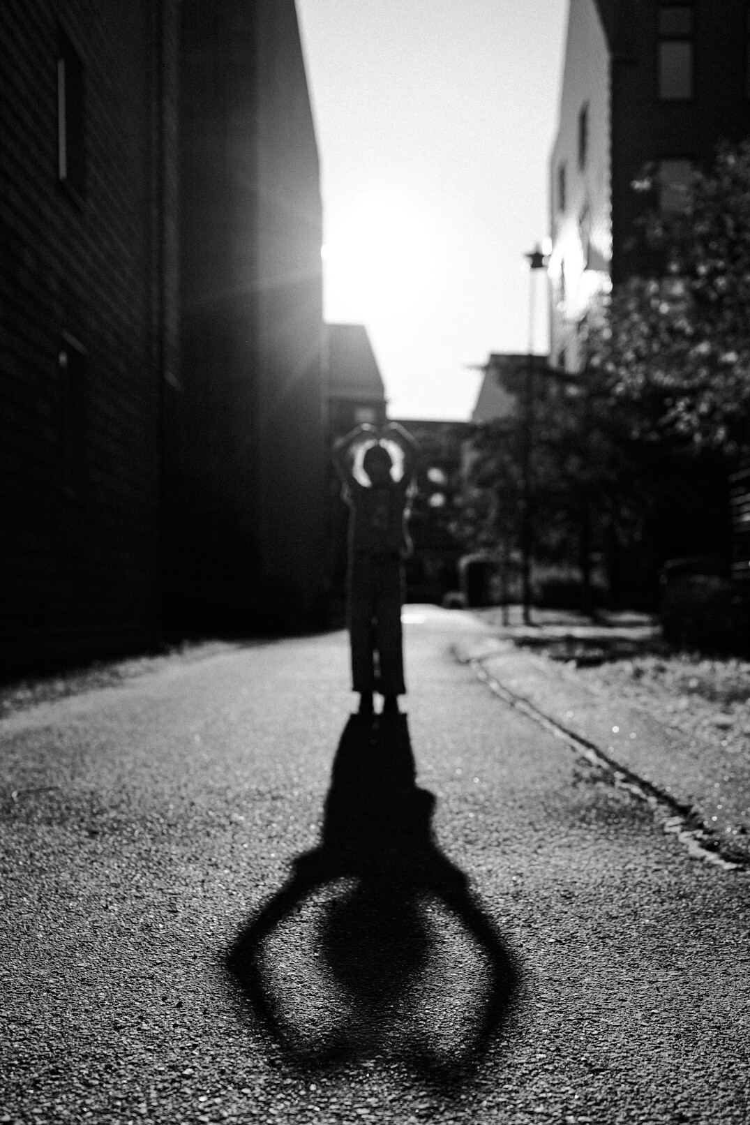shadowy figure in dark alley